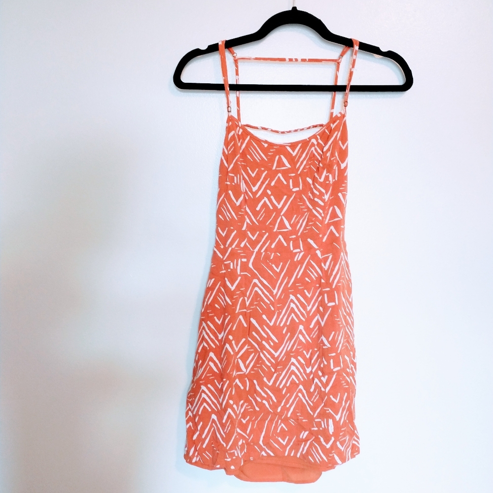 Forever 21 orange mini dress with open back. Has a lining that is slightly longe